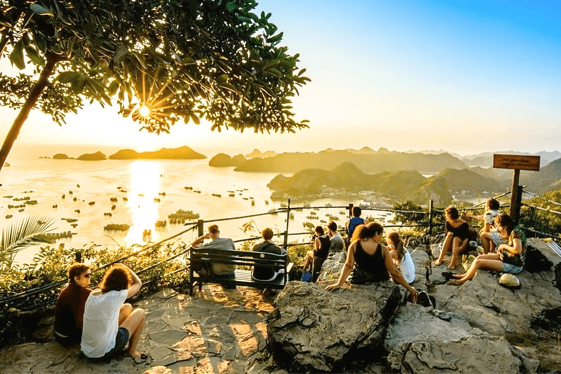 Tourists admiring Lan Ha Bay sunset view in Cannon Fort